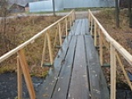 Произведен ремонт пешеходного моста в городке Лесничество